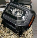 Brand new OEM Sierra headlights both side