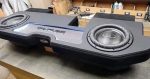 a custom car audio system package that includes: - Amp - Sub box - 2 JL Audio 13.5 TW5’s - Plug and play harness for a HK system - 4 gauge OFC and RCAs - JL Audio 1000/1D - Driver’s side back wall plate - Image 3
