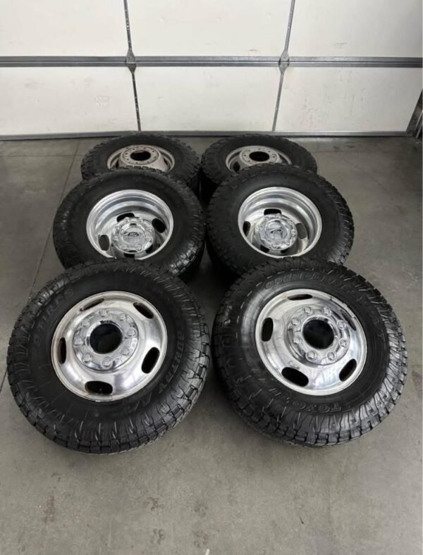 0a81942c-fca1-4280-8070-358ac22b3196-600x788-1 17in OEM ford f350 Dually wheels 255/60/17 Toyo open country at3 tires.