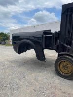 2009–2018 Dodge Ram 1500 5’7” short bed in black. OEM factory bed in good condition, - Image 5