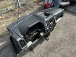 2015 Ford F150  Complete dash panel with instrument cluster, dash airbag, climate controls, and radio.