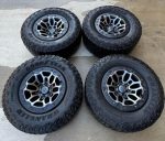 TRX set with Goodyear Wrangler AT 325/65/[hidden information] Tires & OEM TPMS.  Tires have about 7-9/32 18x9 6x139.7