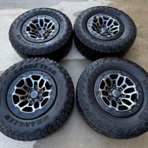 TRX set with Goodyear Wrangler AT 325/65/[hidden information] Tires & OEM TPMS.  Tires have about 7-9/32 18x9 6x139.7