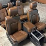 Ford F250/F350 platinum interior comes complete with everything seats center console door panels with switches pillars with seat belts and all plastic trimming carpet and headliner and complete dashboard