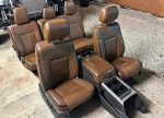 Ford F250/F350 platinum interior comes complete with everything seats center console door panels with switches pillars with seat belts and all plastic trimming carpet and headliner and complete dashboard