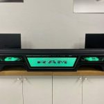Under seat enclosure box for Ram we just wrapped in black leather to match the truck interior Outfitted with two 13tw5 JL Audio woofers, Ram logo and RGB light