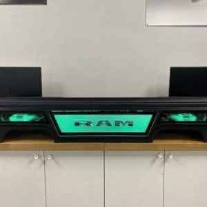 Under seat enclosure box for Ram we just wrapped in black leather to match the truck interior Outfitted with two 13tw5 JL Audio woofers, Ram logo and RGB light