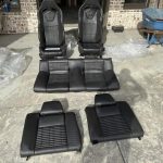 Recaro front and rear seats from a 2013 GT500. Black leather with black stripes. 800 miles on them.