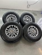 18in OEM f350 king ranch  35x12.50r18 Toyo open county at3 tires  Wheels are 18in OEM wheels off a 2022 ford f350 king ranch package.