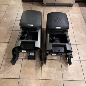 2009-2018 Dodge ram center console in black and grey.