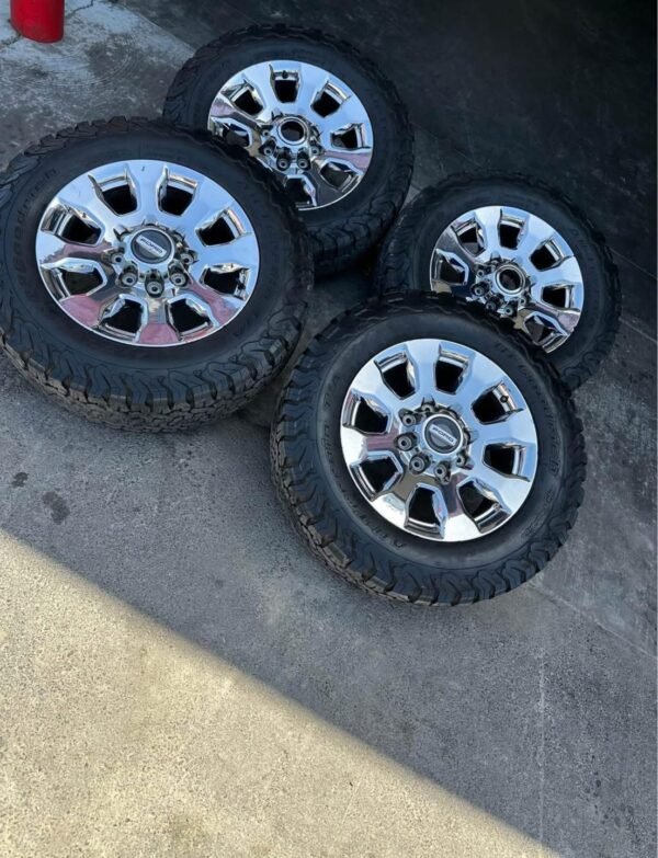 6ebf9c50-590c-4cf5-8c2c-944cfa1629f6-600x783-1 20” OEM Ford f250 king ranch wheels 275/65/20 BFG KO2 all terrain tires Wheels are 20in OEM wheels off a 2022 ford f350 king ranch package.