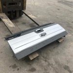 99-16 stamped superduty platinum tailgate with the camera and step.