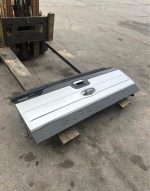 99-16 stamped superduty platinum tailgate with the camera and step.