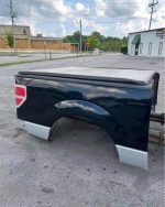 09-14 Ford F-150 5.5’ short bed in really good condition. Comes with spray in bed liner, tonneau cover and taillights - Image 6