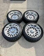 American Force atom 24x12 with new 35x12.50x24 versatyre HD M/T for Ford SuperDuty F250-F450 8x170 bolt pattern lig TMPS Sensors Included