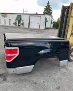 09-14 Ford F-150 5.5’ short bed in really good condition. Comes with spray in bed liner, tonneau cover and taillights - Image 4