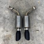 Mustang GT Roush black tip axlebacks.