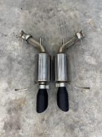 Mustang GT Roush black tip axlebacks.