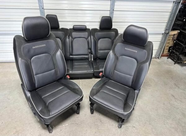 8f7271b1-c11b-478c-9333-142916ee257c-600x437-1 2019-2023 dodge ram 1500 black leather laramie crew cab front and rear seats