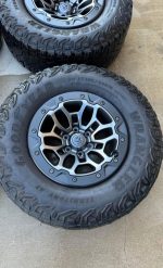 TRX set with Goodyear Wrangler AT 325/65/[hidden information] Tires & OEM TPMS.  Tires have about 7-9/32 18x9 6x139.7 - Image 4