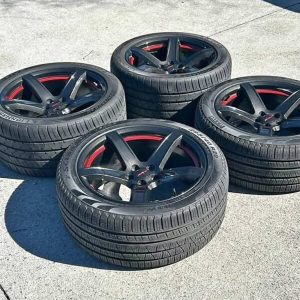 Dodge Charger Hellcat Carbon Fiber dip wheels with tires.