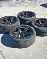 Dodge Charger Hellcat Carbon Fiber dip wheels with tires.