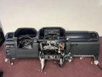 2022 FORD F150 LARIAT DASH DASHBOARD TRIM ASSEMBLY WITH MOUNTING BRACKET AND WIRES.