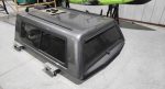 A.R.E. camper shell. Came off a 2022 F250 with a 6’9” bed. Carbon Grey. Everything works as it should. Comes with 1 key 🔑.