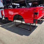 2025 Ford F250 takeoff bed. This has the bliss tail lights which are very expensive and the step down tailgate pan code is PQ red