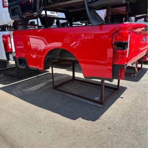 2025 Ford F250 takeoff bed. This has the bliss tail lights which are very expensive and the step down tailgate pan code is PQ red