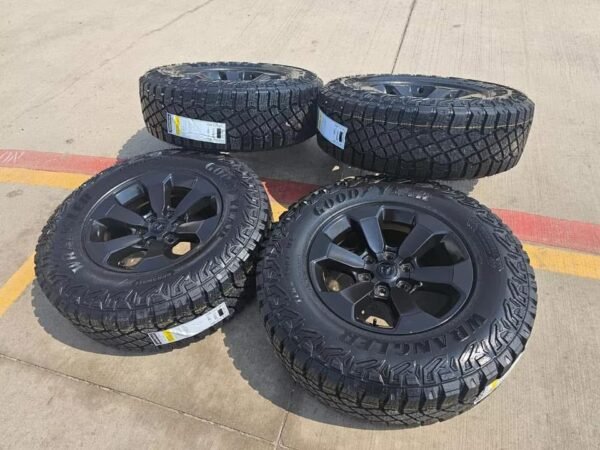 bd099252-4d99-4d30-a340-e4cc2d92c903-600x450-1 18" Dodge Ram 1500 Rebel Black OEM wheels rims tires