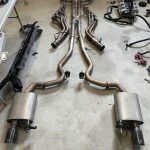 Texas speed 1 7/8” long tube headers. Headers to exhaust ￼has been v-banded.  Exhaust is Borla mufflers with black tips.  Can’t really split it up as it’s been V banded together