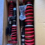 Pedders Extreme XA Coilovers w/ camber plates.