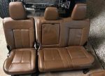 Ford F250/F350 platinum interior comes complete with everything seats center console door panels with switches pillars with seat belts and all plastic trimming carpet and headliner and complete dashboard - Image 11