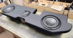 a custom car audio system package that includes: - Amp - Sub box - 2 JL Audio 13.5 TW5’s - Plug and play harness for a HK system - 4 gauge OFC and RCAs - JL Audio 1000/1D - Driver’s side back wall plate